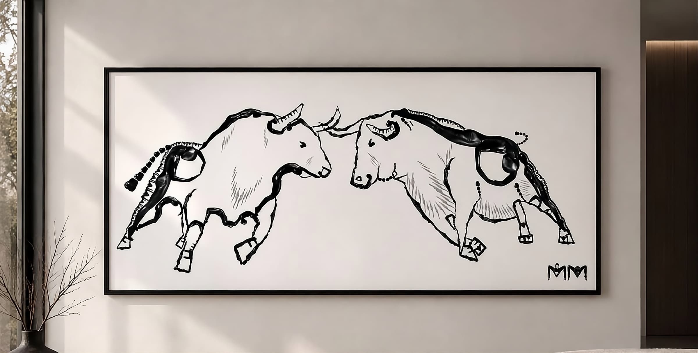 Framed artwork of two bulls facing each other
